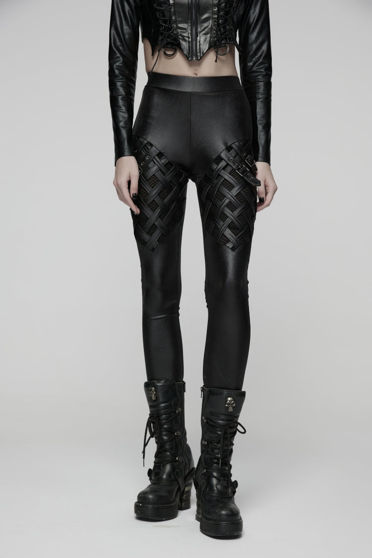 Schwarze, schlanke Damen-Leggings mit geflochtenen Riemen und Schnalle im Punk-Stil